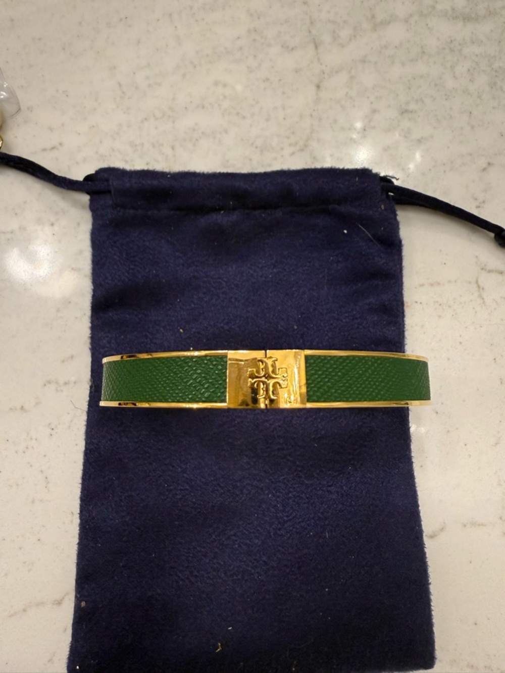 Tory Burch Kira Green Enamel Gold-Tone Logo Bangle Bracelet.
